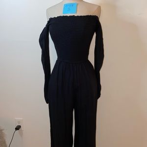Black jumpsuit for sale. Long sleeves.